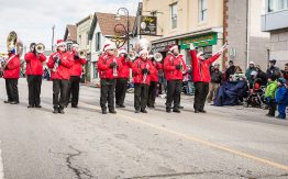 Acton Citizen's Band playing and walking in Santa Claus parade