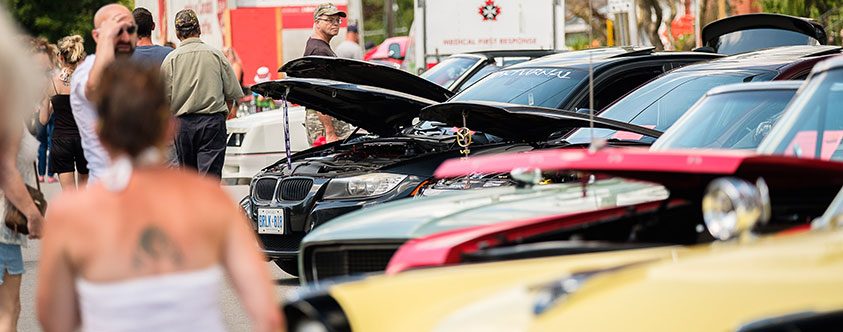 hoods of classic cars at the Leathertown car show