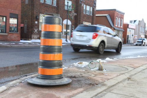 Picture of damaged waste receptacle.
